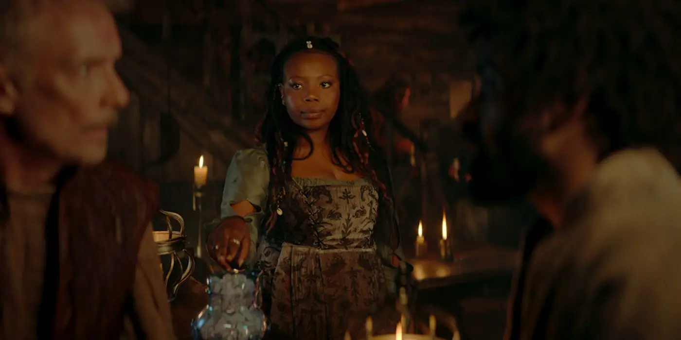 Mimi M Khayisa como Fringilla Vigo en una taberna en The Witcher