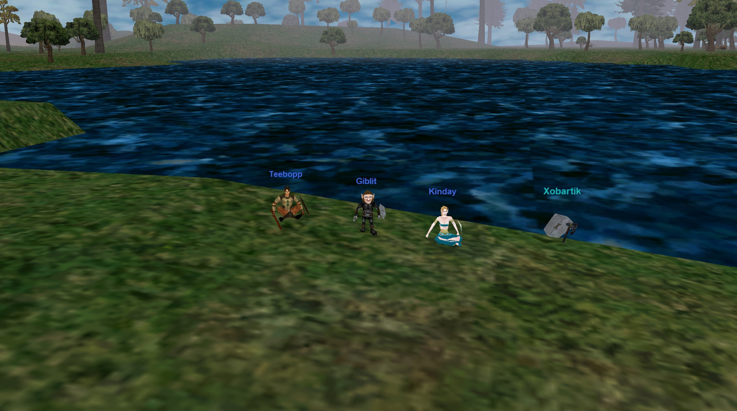 jugadores reunidos a orillas del lago