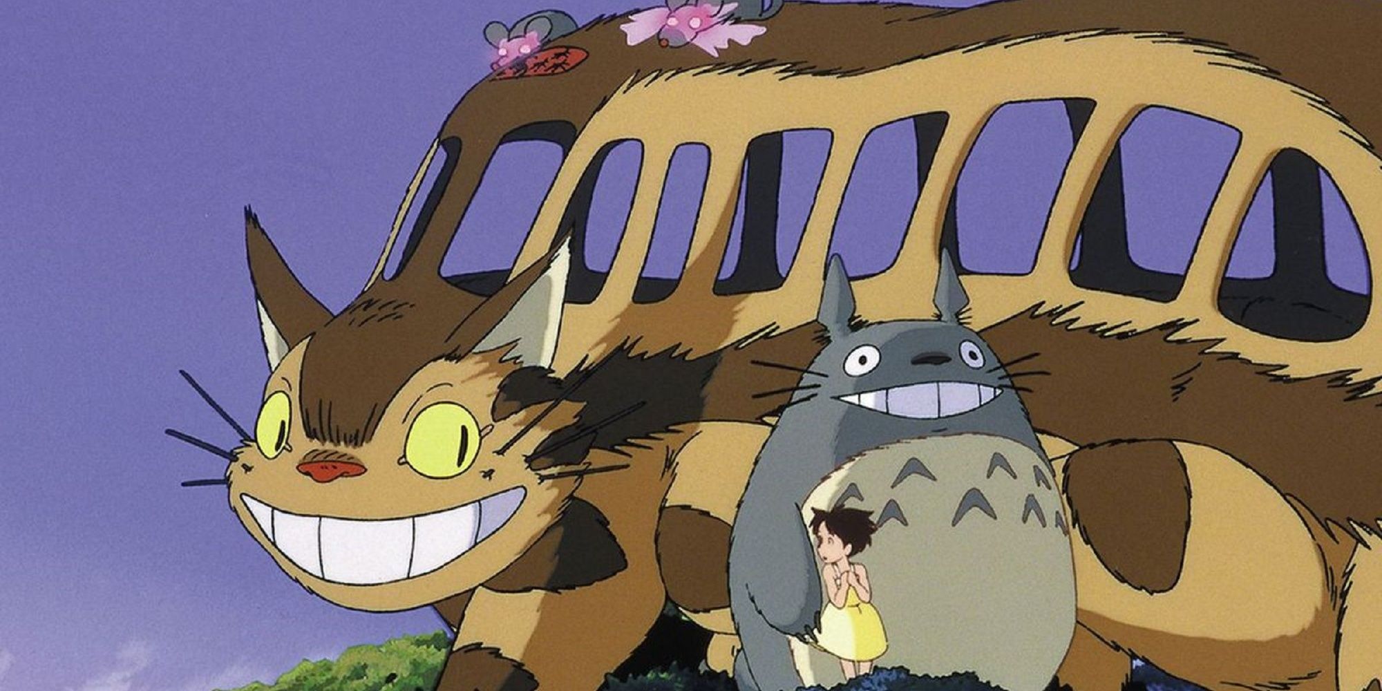 Catbus sonriendo a Totoro y Satsuke en Mi vecino Totoro.
