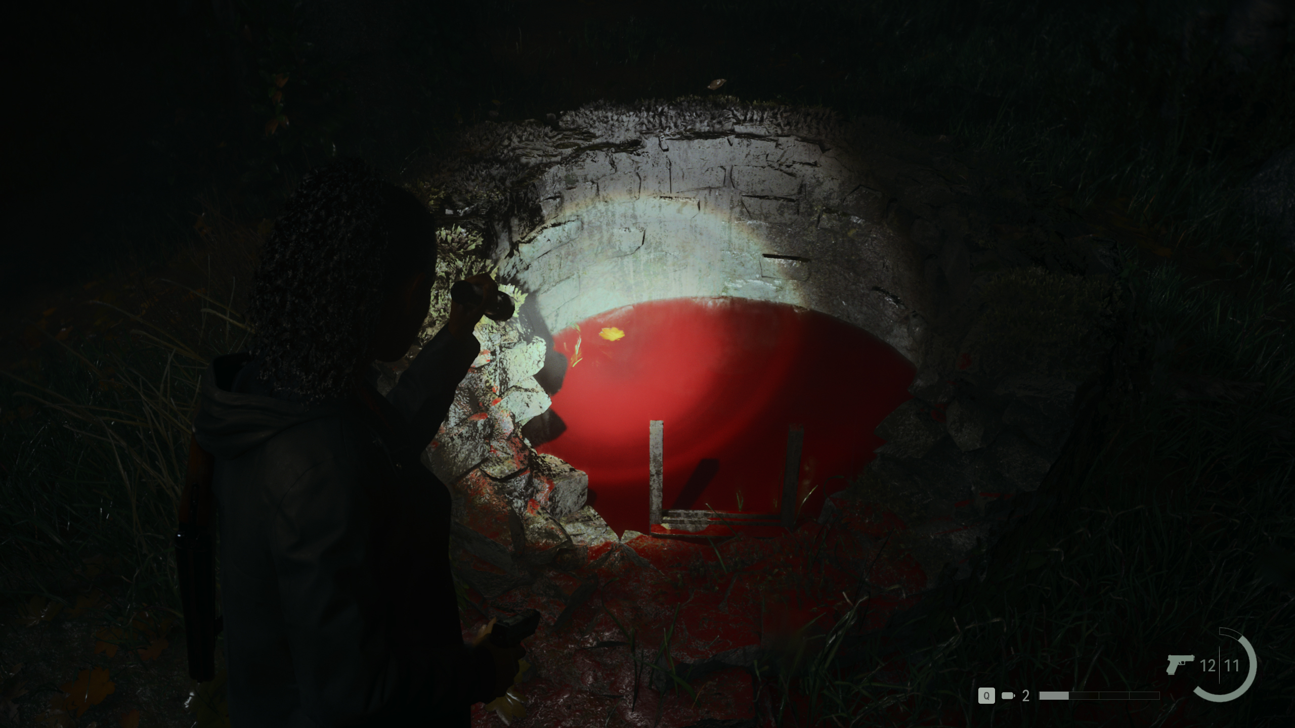 Alan Wake 2 - Saga ilumina con su antorcha un pozo lleno de sangre