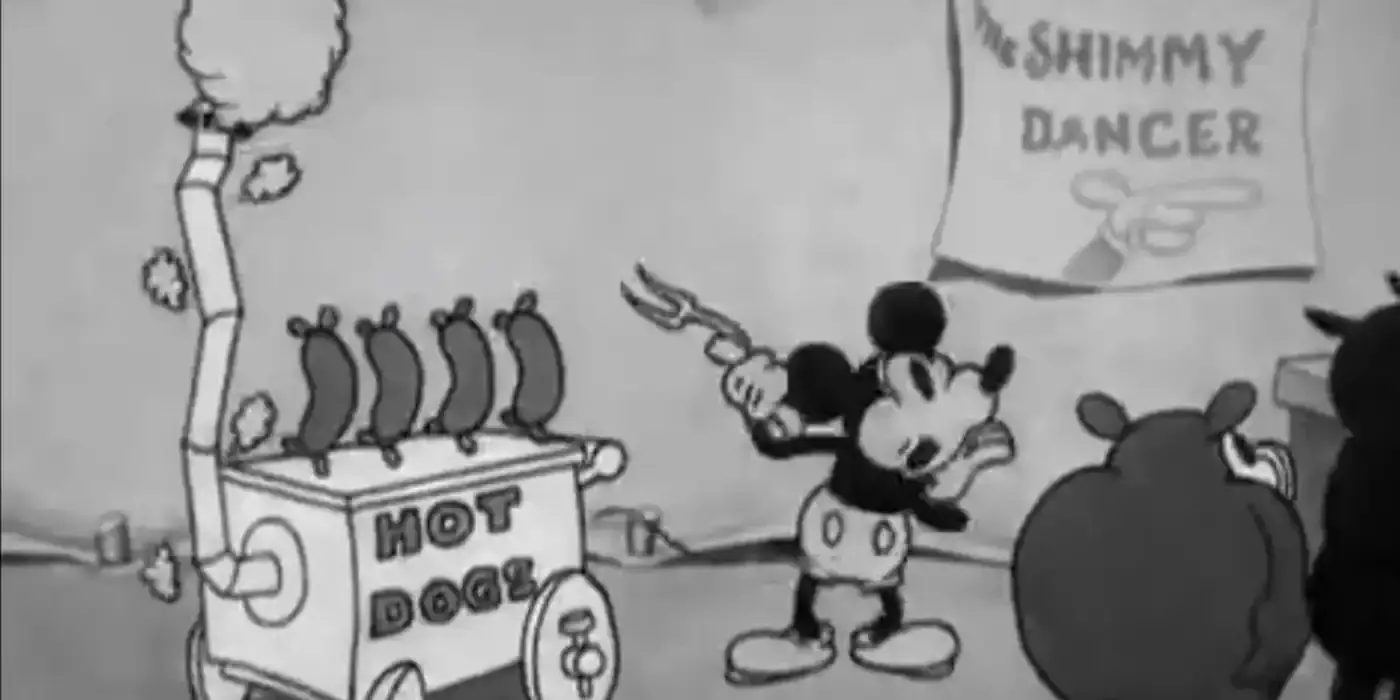 Mickey Mouse vendiendo perritos calientes