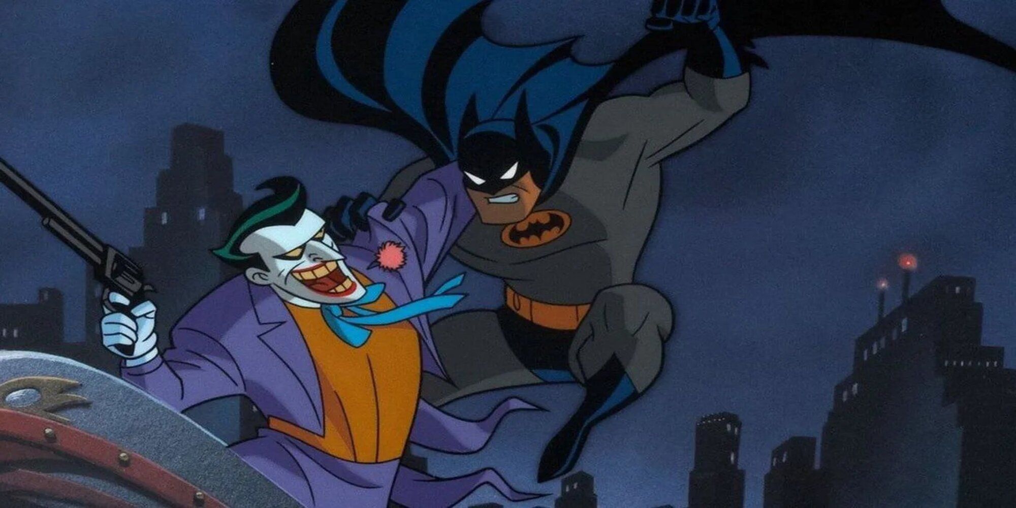 Batman y Joker peleando en una azotea en Batman: La Serie Animada