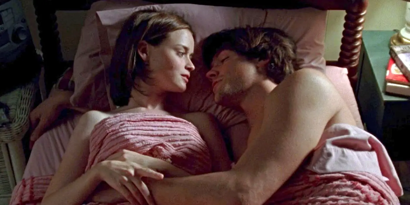 Rory y Dean (interpretados por Alexis Bledel y Jared Padalecki) acostados juntos en la cama en Gilmore Girls